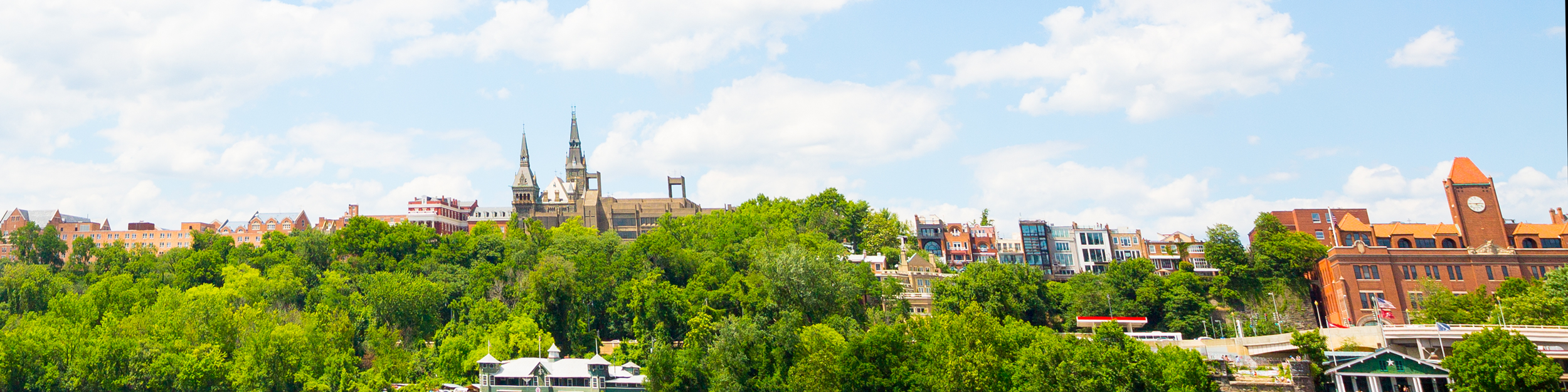 Georgetown University as seen from the middle of the Potomac River on a tall hill