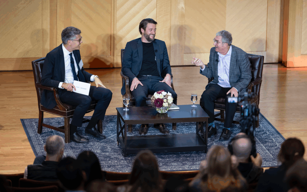 Safak Yucel (left), David Eagles (center, Goodwill), and Scot Case (right, NRF) on Lohrfink stage at Georgetown McDonough