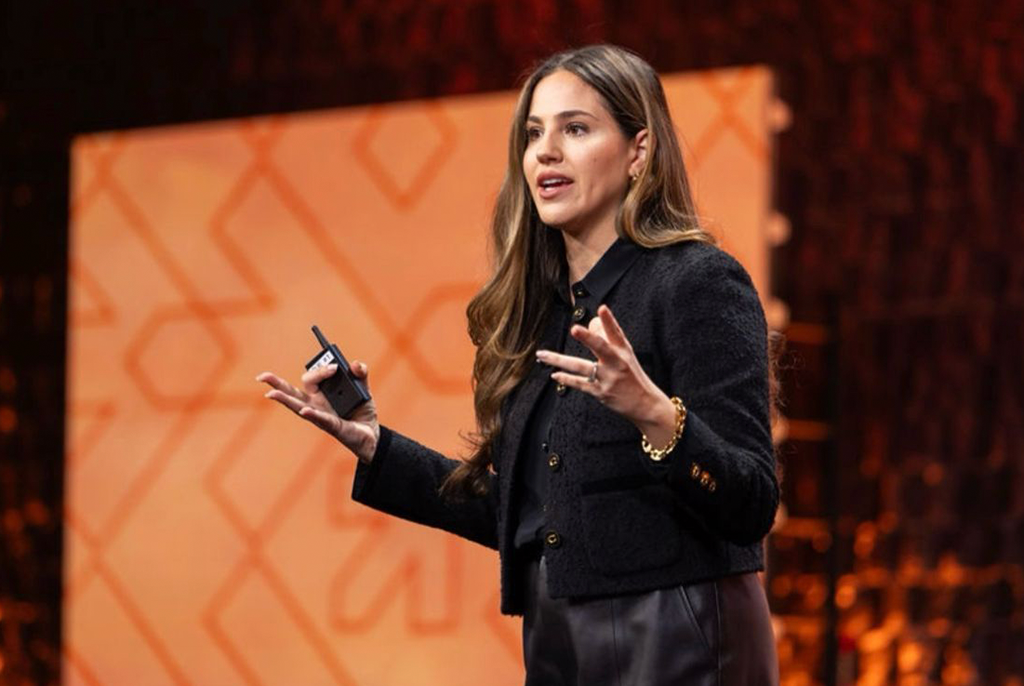 Close up of Julia Furnari speaking on stage at the NRF Foundation Student Program