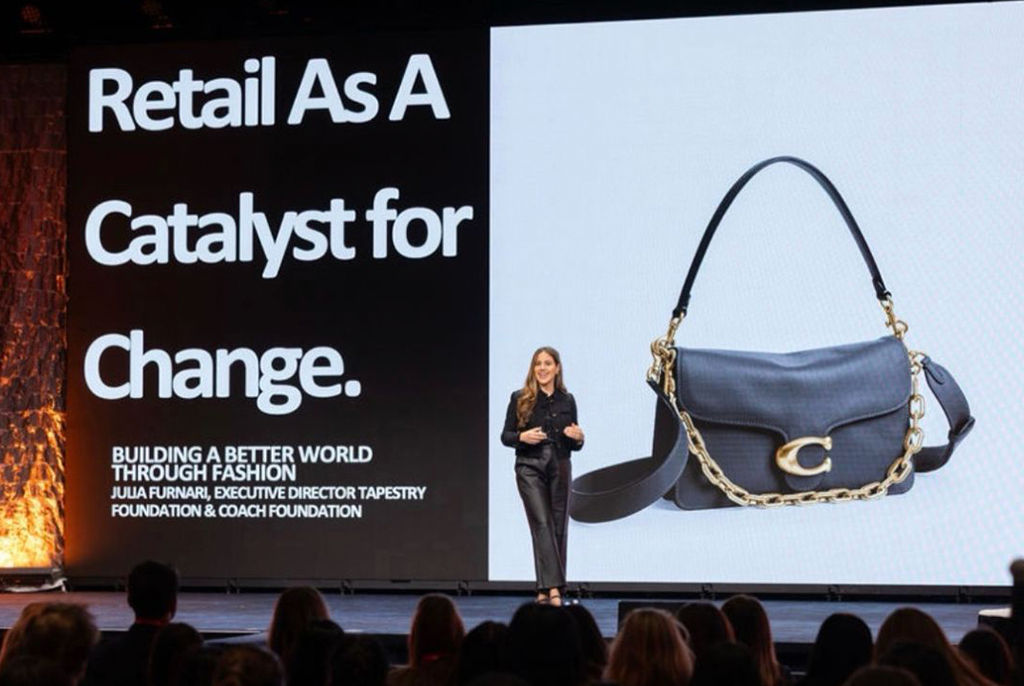 Julia Furnari speaking on stage about "Retail as a Catalyst for Change."